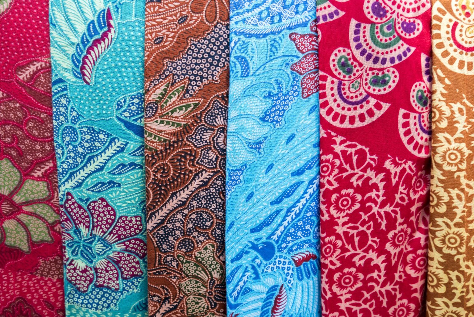 Assortment of colorful sarongs for sale at the art and craft market of Ubud on Bali Island, Indonesia