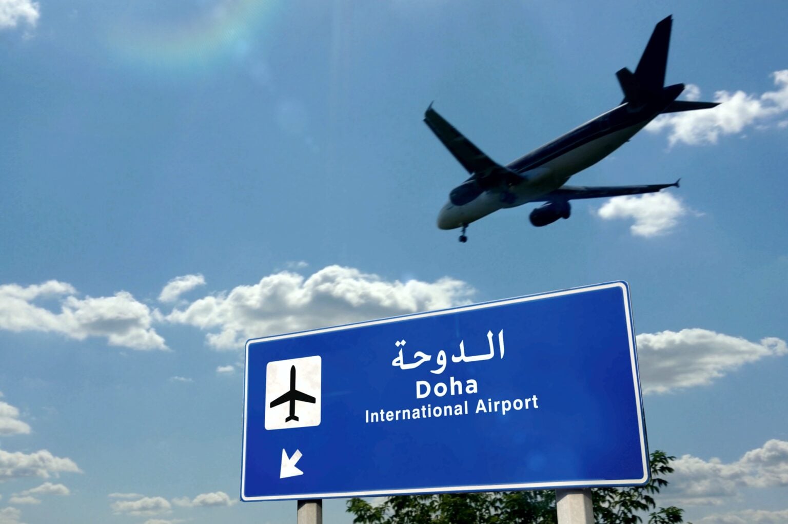 Airplane silhouette landing in Doha, Qatar. City arrival with international airport direction signboard and blue sky in background. Travel, trip and transport concept 3d illustration.